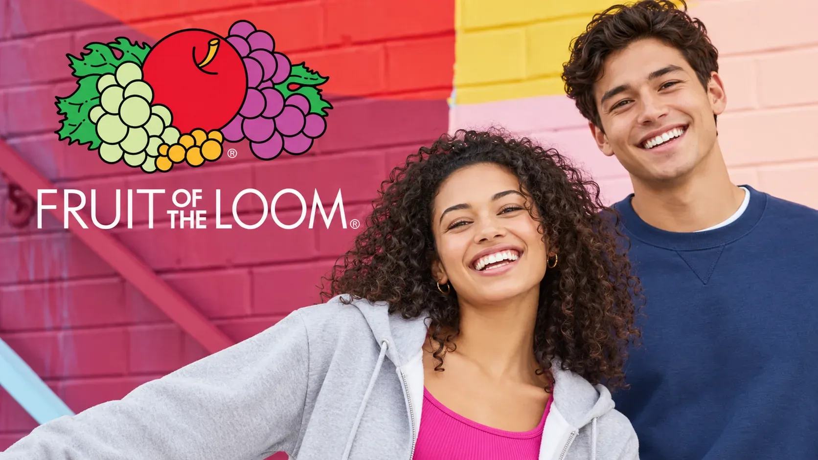 fruit logo, grape cluster, peach, brick wall, two people